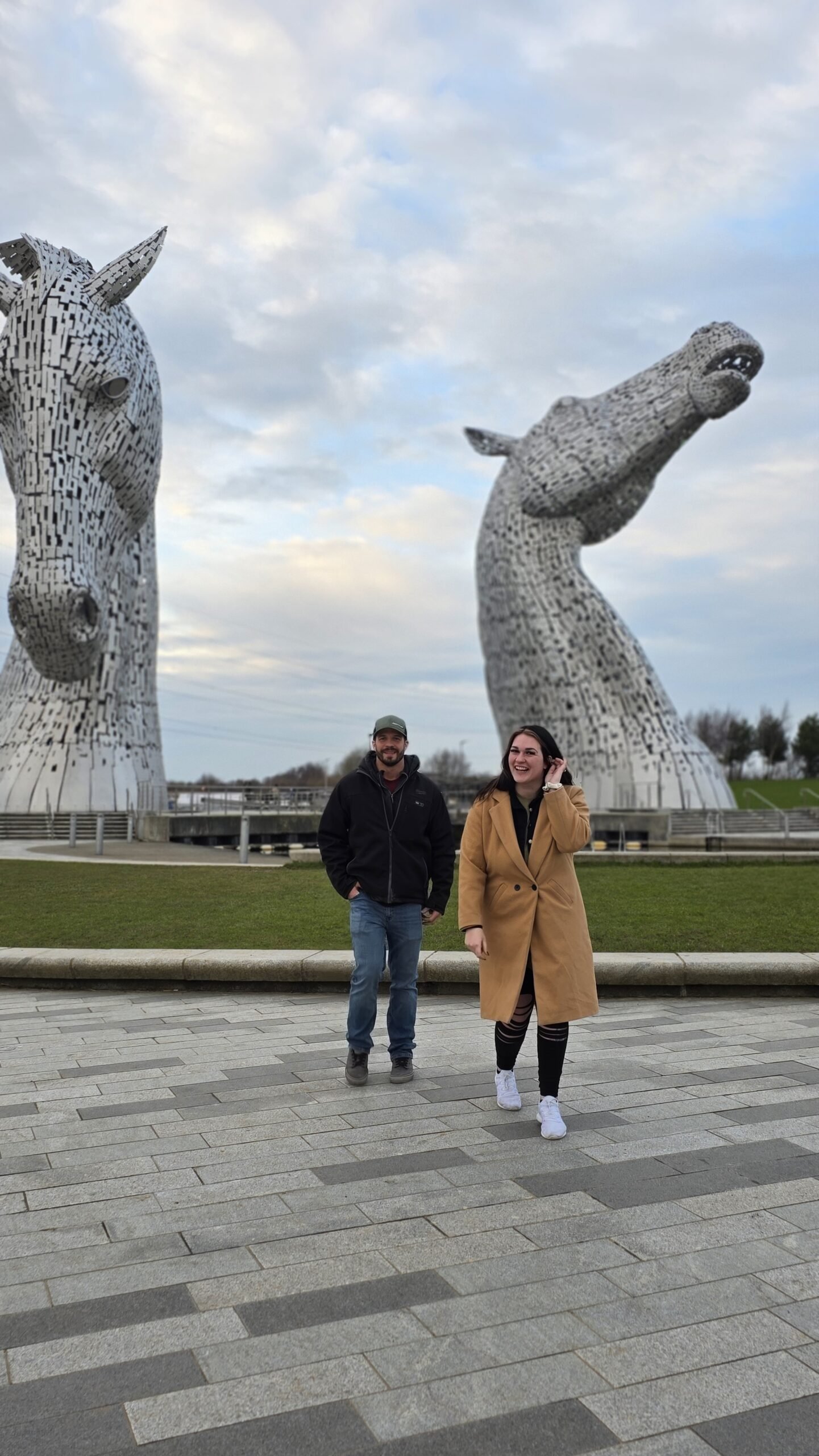 Travel moment at The Kelpies in Falkirk, Scotland — a perfect stop for couples travel adventure tips and connection.