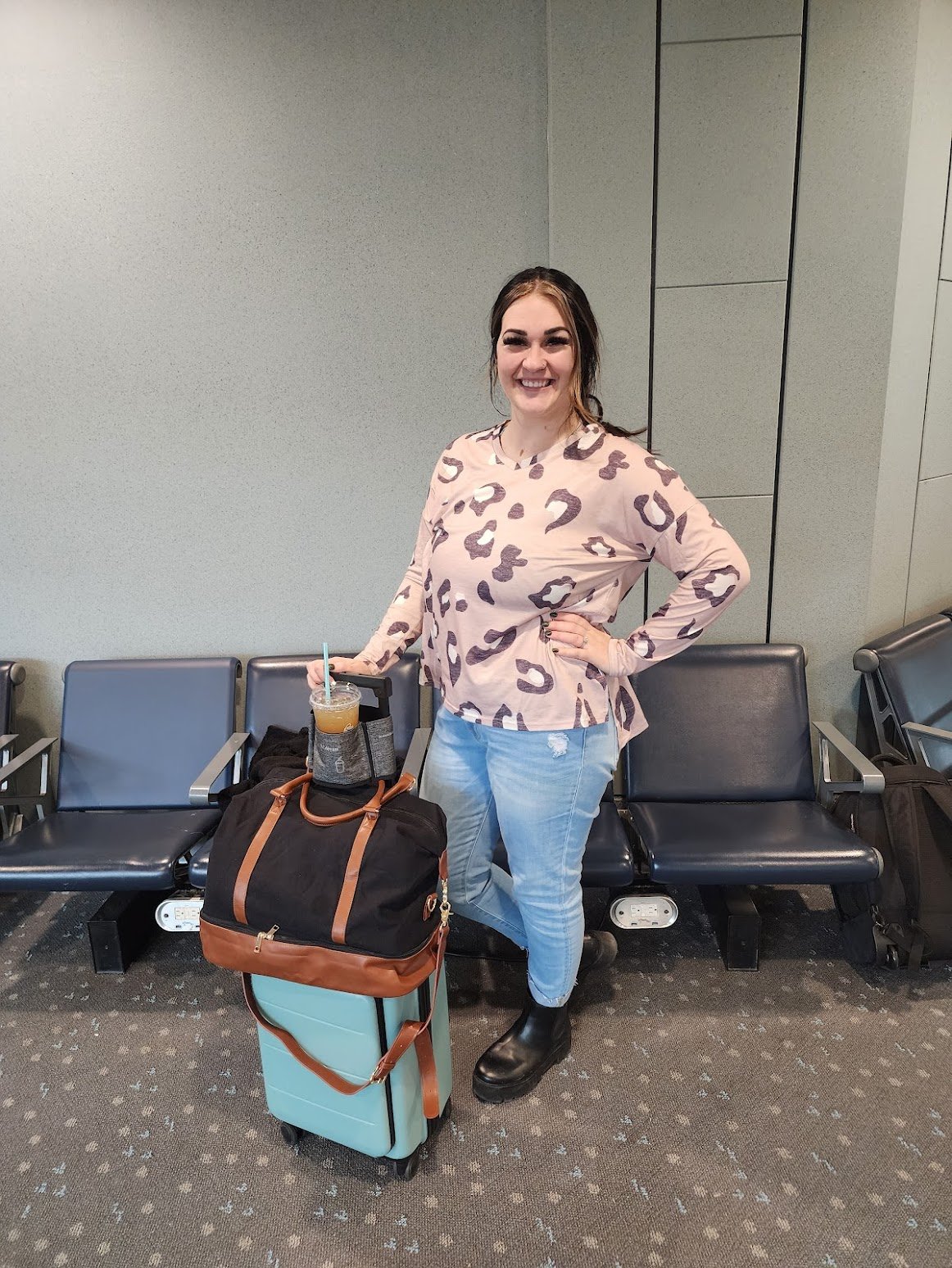 Couple packing light for a romantic travel adventure through Paris, Edinburgh, and Málaga.