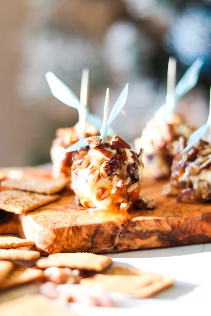 Honey goat cheese balls coated in pecans, an elegant new years eve food ideas for parties