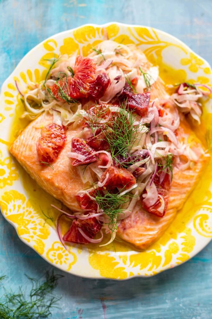 Slow-roasted salmon topped with orange and fennel salad, an elegant choice for healthy recipes for New Year and healthy New Year food