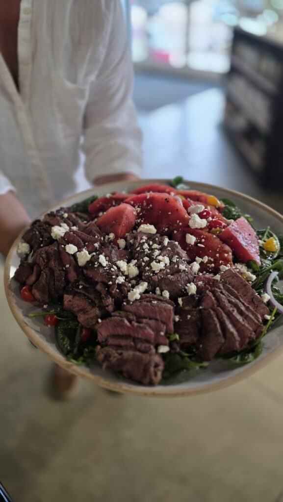 Steak Salad dish with Feta, Tomatoes and Onion